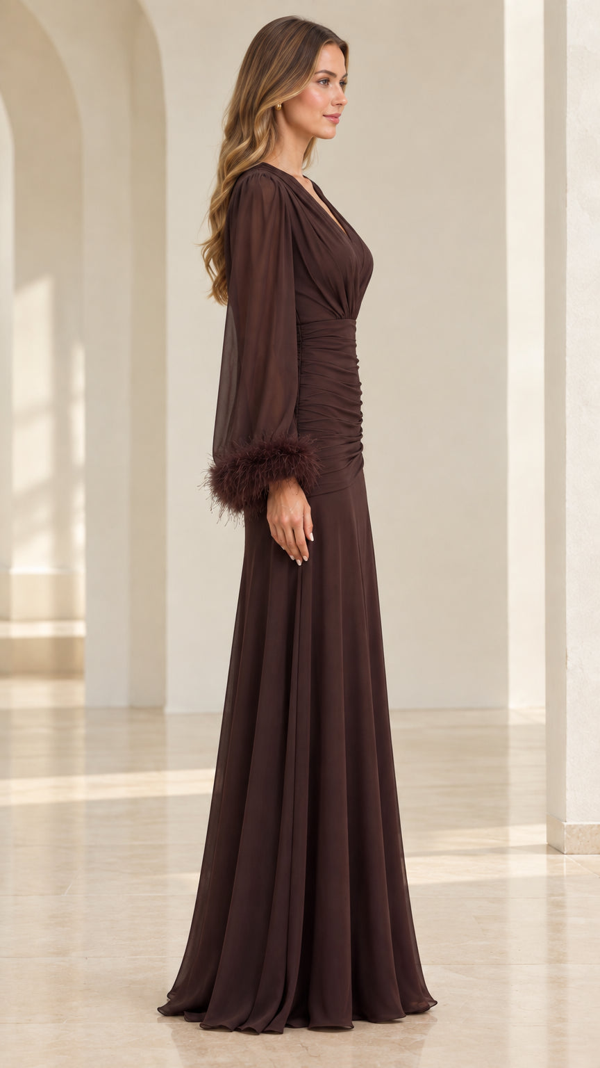 Side profile view of chocolate brown formal maxi dress showing long sheer sleeves