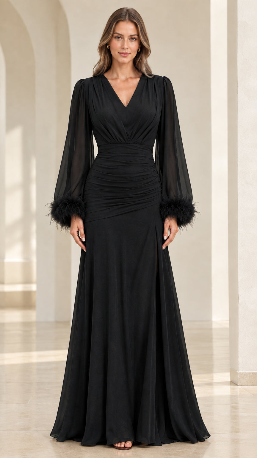 Model wearing black long-sleeve evening gown with feather cuffs and ruched waist