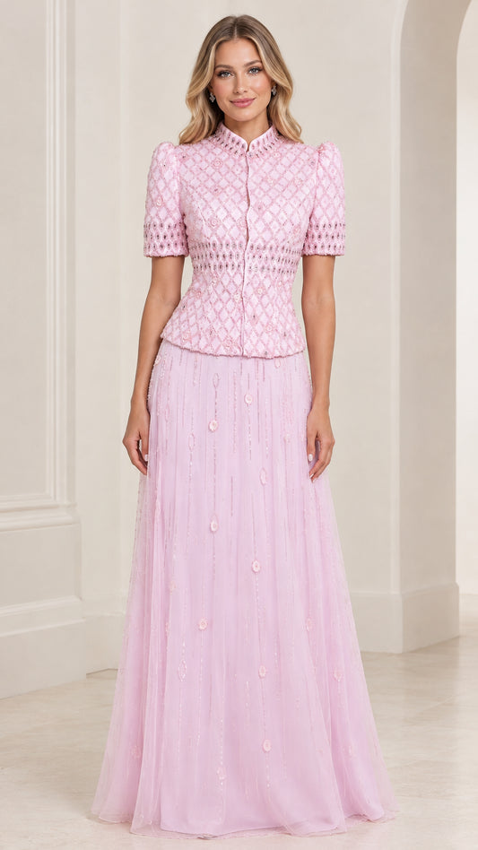 Front view of woman wearing Light Pink embroidered high neck evening gown