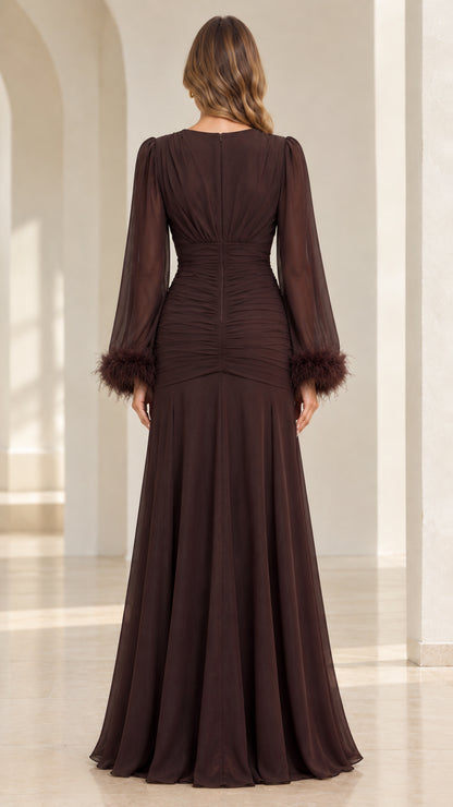 Back view of chocolate brown evening dress showing invisible zip closure and draped skirt
