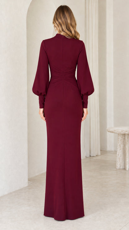 Back view of burgundy fitted ruched waist maxi dress
