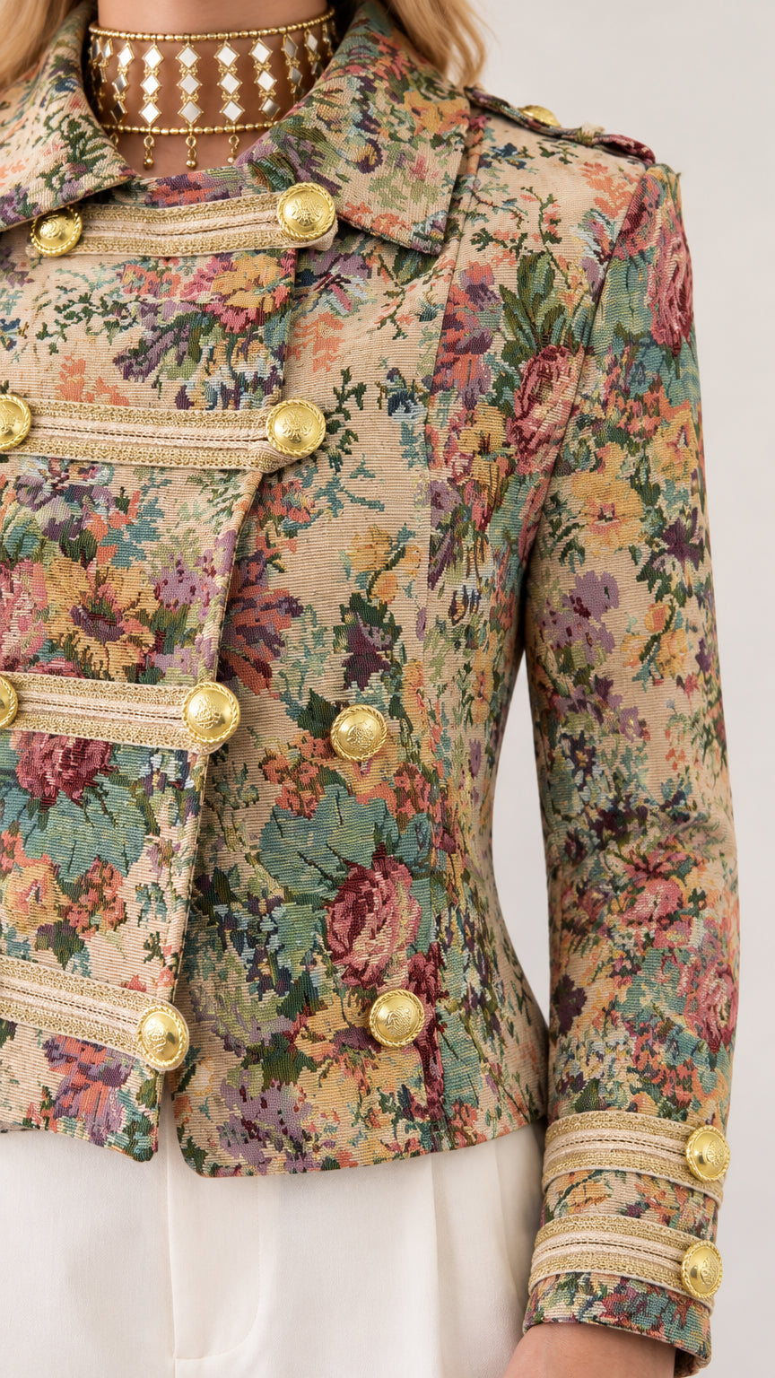 Close-up detail of Multi Floral tapestry jacket showing metallic braid trim and embossed gold buttons