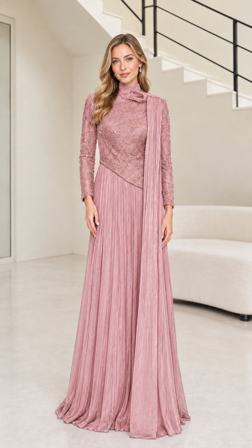 Front full-length view of dusty rose pink long sleeve embellished evening dress with shoulder drape