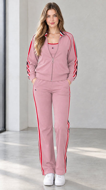 Front view of woman wearing dusty pink contrast stripe track jacket and pants set