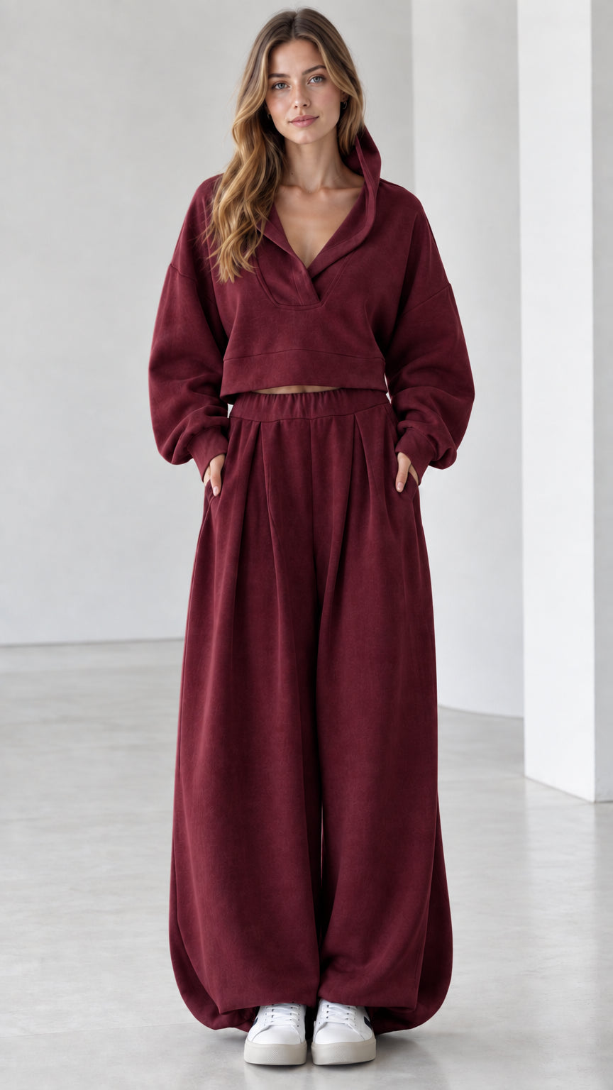 Full front view of women's two-piece cropped hoodie and wide-leg sweatpants set in Burgundy