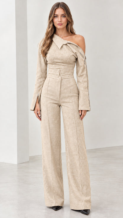 Front view of model wearing beige tailored one-shoulder wide-leg jumpsuit